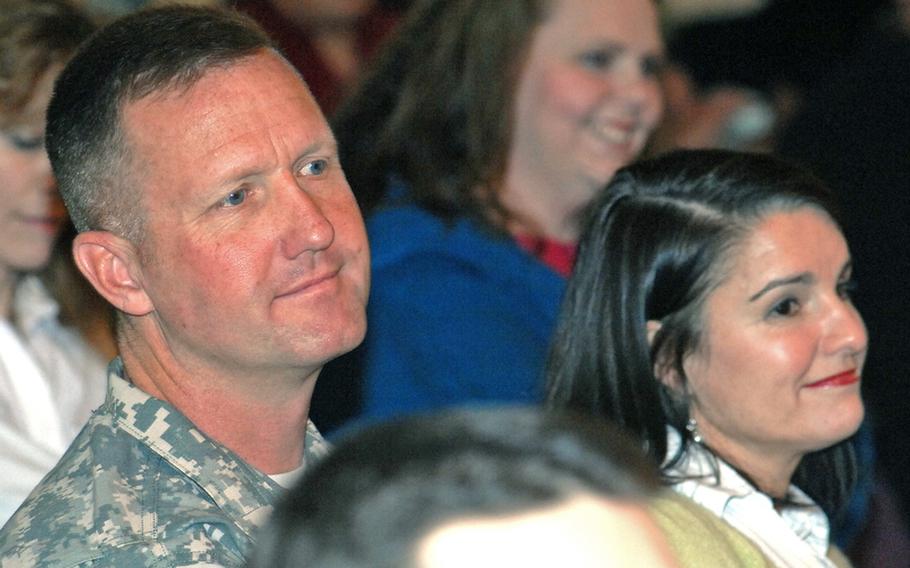 Col. James Blackburn, commander of the 2nd Stryker Brigade, and his wife, Carla, attend a town hall meeting for 2nd SCR families on Tuesday.