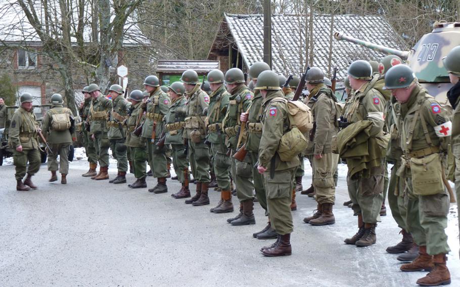 A group of re-enactors from Britain fall in line prior to starting the 2010 memorial walk in La Gleize, Belgium. Like last year, the 2011 march is expected to cover 14-15 miles.