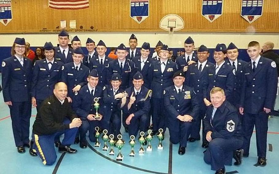Members of the Junior Reserve Officers&#39; Training Corps drill team at Wiesbaden High School pose with their instructors after winning the annual drill competition for all Navy and Air Force ROTC  programs  in the Department of Defense Dependents Schools in Europe last weekend in Ramstein, Germany.