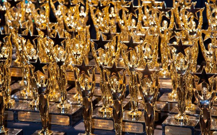 A sparkling array of trophies awaits winners of the annual Topper awards given to the best performers and crew members in community theater. The award takes its name from the Tournament of Plays, during which a touring panel of judges evaluates plays from different theater groups.