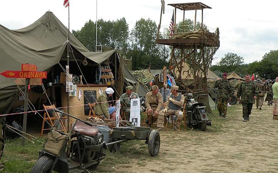 Mock base camps similar to these housed hundreds of re-enactors during the five-day War and Peace show July 20-24 in England. 
