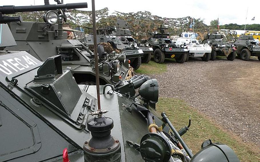 A row of Daimler Ferrets on display July 23 at the War and Peace show. Many of the vehicles featured in the show are privately owned. 
