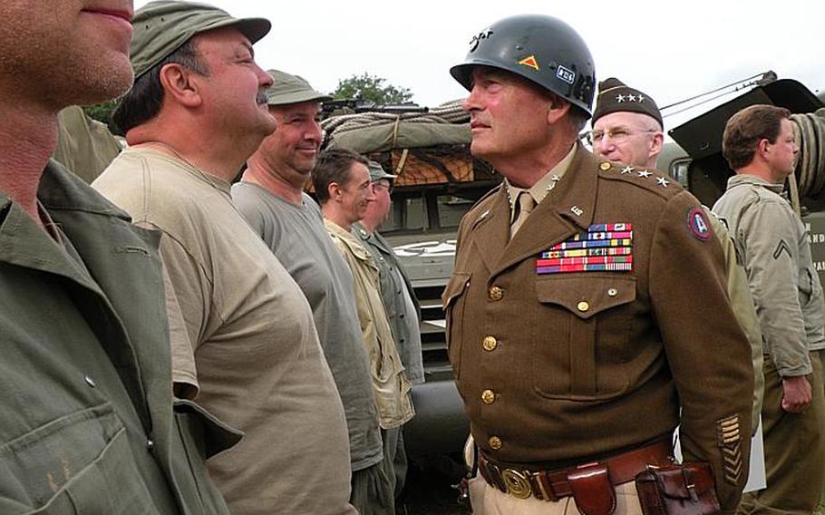 A gentleman portraying Lt. Gen. George Patton stopped by this particular camp to assess his troops at this year's War and Peace show. 
