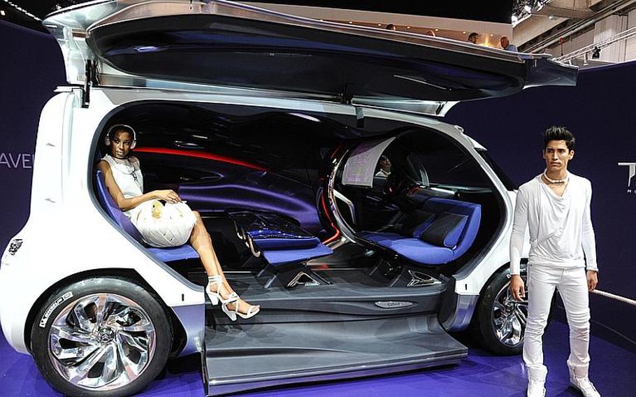 French automobile maker Citroën is showing off its Tubik, a hybrid concept van, at the Frankfurt International Motor Show. The Tubik, which seats nine, features a lounge-like interior, an egg shaped driver's area, fold down seats made of felt and silk and a leather floor.