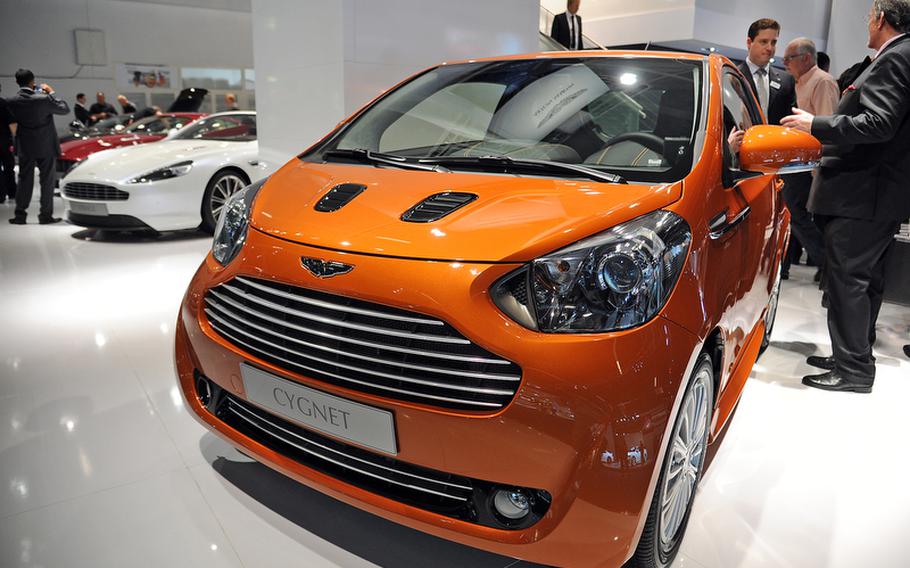 The Aston Martin Cygnet on display at the Frankfurt International Motor Show is a sheep in wolf&#39;s clothing -- it is a Toyota IQ redesigned by the fabled car maker.