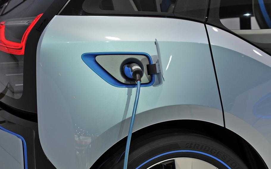 Electric plugs instead of gas nozzles may be the way of the future, at least for traveling short distances, as seen here on the BMW i3 Concept, shown here at the Frankfurt International Motor Show.