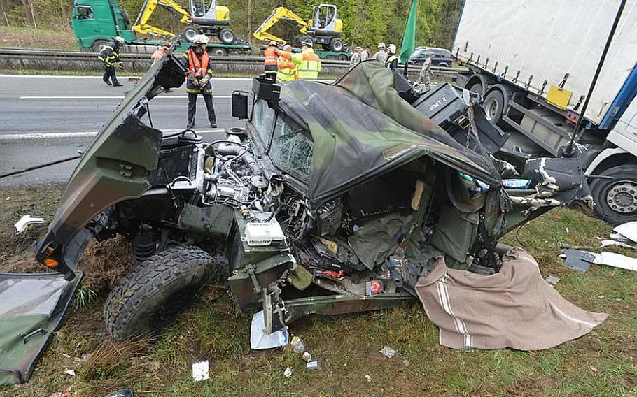 A U.S. Army Humvee lies in shambles after it was struck by a civilian truck on the autobahn near Bamberg, Germany, on Tuesday. A U.S. soldier was killed and five others were injured. The truck driver, from Nuremberg, was slightly injured.

Courtesy of Ronald Rinklef