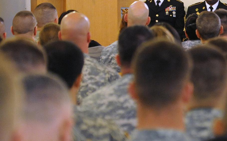 Lt. Col. Joseph DeCosta, commander of the 95th Military Police Battalion, speaks during the memorial ceremony for Staff Sgt. Dick A. Lee Jr. in Heidelberg, Friday. Lee was killed in Afghanistan April 26th, when his vehicle hit a roadside bomb. Also killed in the blast were Staff Sgt. Brandon F. Eggleston, and Lee&#39;s working dog Fibi.