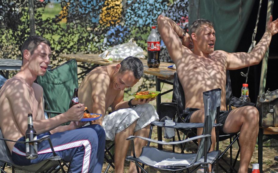 German soldiers clown around over lunch at the 29th annual Monte Kali Pokal shooting competition at the Wackernheim Regional Range complex, near Wiesbaden. More than 1,500 shooters competed in the three-day event representing NATO and Partners for Peace nations.