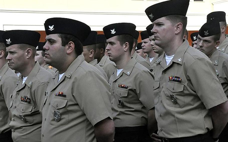 Servicemembers in formation remember the victims of the Sept. 11, 2001, terrorist attacks in the United States during a ceremony Sept. 11, 2012, at the Capodichino base of Naval Support Activity Naples, Italy.