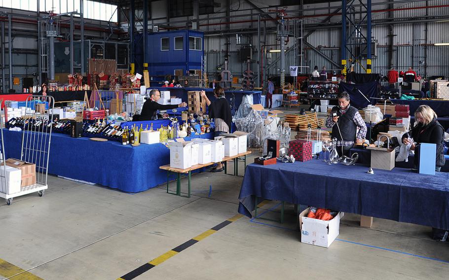 Vendors set up for the 48th annual Ramstein Welfare Bazaar that kicks off Sept. 13, 2012, at Ramstein Air Base, Germany. More than 140 vendors will be selling wares such as ceramics and tapestries from across Europe this weekend.