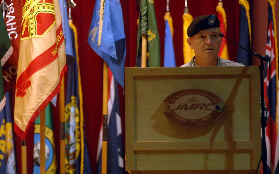 Col. John G. Norris speaks to an audience after he assumed command of the Joint Multinational Readiness Center in Hohenfels, Germany, on Sept. 19, 2012. Norris takes control of the maneuver training center less than a month before it hosts U.S. Army Europe's largest exercise in 13 years.