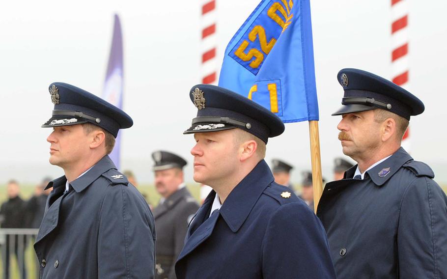 Col. David Lyons, commander of the Spangdahlem, Germany-based  52nd Operations Group, left, Maj. Matthew Spears, the new commander of Detachment 1, 52nd Operations Group, center, and Chief Master Sgt. Bill Wardell at Detachment 1's activation ceremony in Lask, Poland, Friday. Detachment 1 is the first U.S. military unit permanently stationed in Poland.
