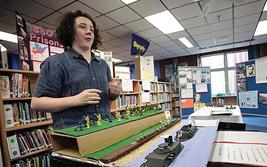 Joseph Begin, an eighth-grade pupil at Landstuhl Elementary/Middle School in Germany, talks about a diorama he and two classmates created to depict the siege of Vicksburg during the Civil War.