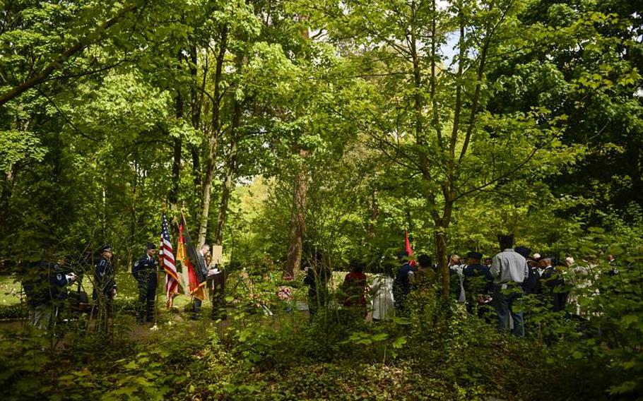 Distinguished visitors and guests attend the annual Kindergraves memorial service May 18, 2013, at the main cemetery in Kaiserslautern, Germany. 

