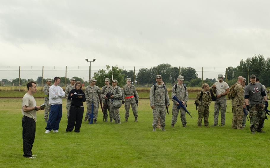 Participants in the 352nd Special Operations Group's Monster Mash gather for a course briefing at RAF Mildenhall, England, on Wednesday, July 3, 2013. The course was part of the SOG Olympics, a series of competitions and a prelude to the Fourth of July holiday.