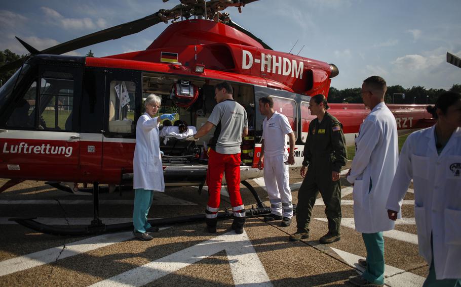 A German medical helicopter transports a patient on extracorporeal membrane oxygenation treatment from Wurzburg, Germany, to Landstuhl Regional Medical Center on July 9, 2013.