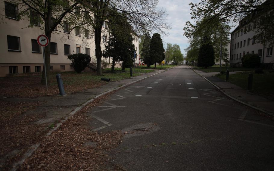 Leaves litter an empty street at the U.S. Army's Mark Twain Village in Heidelberg, Germany, where the Army held its final retreat ceremony Friday. After nearly seven decades, the Army is moving out of the city as part of an ongoing realignment of forces in Europe.