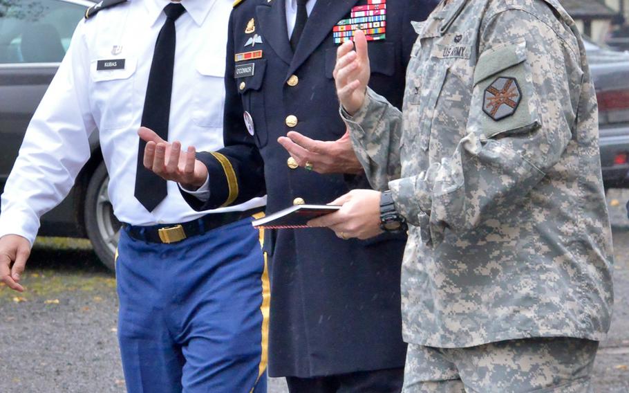 Col. Peter Kubas, left, of the 30th Medical Brigade and Col. Shawn Wells Jr.,right, commander of U.S. Army Garrison Rheinland-Pfalz, brief Maj. Gen. John R. O'Connor, commanding general of the 21st Theater Sustainment Command, during a ''walk-through'' on Nov. 7, 2014, of the controlled monitoring area established at Smith Barracks in Baumholder. Some servicemembers coming from Ebola outbreak areas in West Africa in support of Operation United Assistance will spend three weeks at the facility, a procedure implemented out of an abundance of caution to preclude any possibility of transmitting Ebola, officials say. 