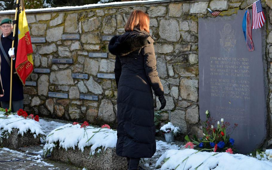Denise Campbell Bauer, the U.S. ambassador to Belgium, pauses for a moment after laying a wreath at the Malmedy Massacre Memorial on the outskirts of Baugnez, Belgium, Sunday, Dec. 14, 2014. On Dec.17, 1944, Nazi SS troops murdered 84 American prisoners of war during the Battle of the Bulge. Baugnez is a suburb of Malmedy.