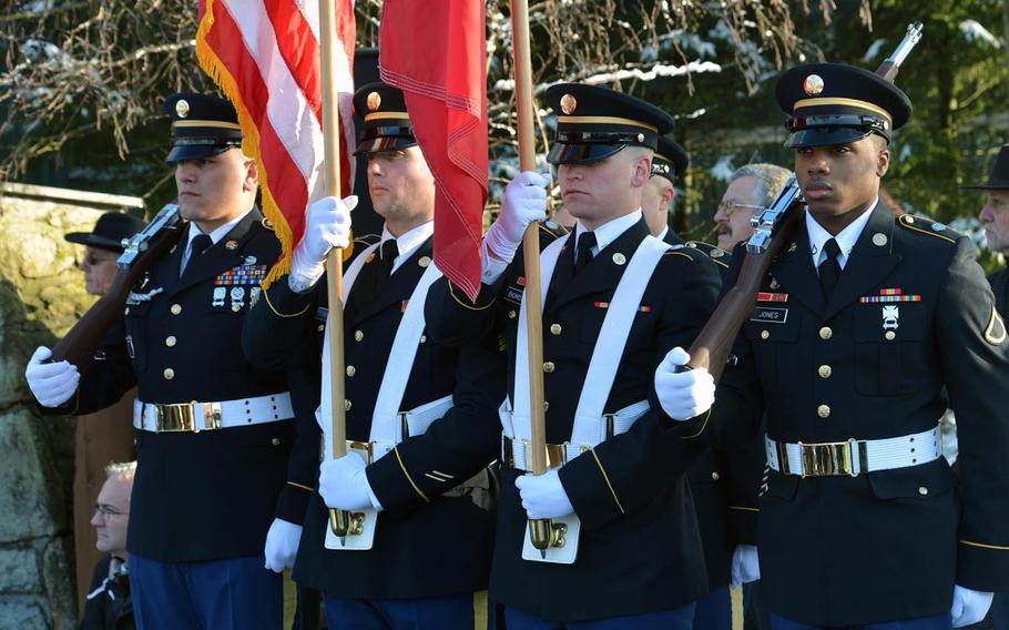 Members of an American honor guard made up of soldiers from USAG Benelux and SHAPE stand in formation at a ceremony marking the 70th anniversary of the Malady massacre, Sunday, Dec. 14, 2014. On Dec.17, 1944, Nazi SS troops massacred 84 American prisoners of war during the Battle of the Bulge. Baugnez is a suburb of Malmedy.