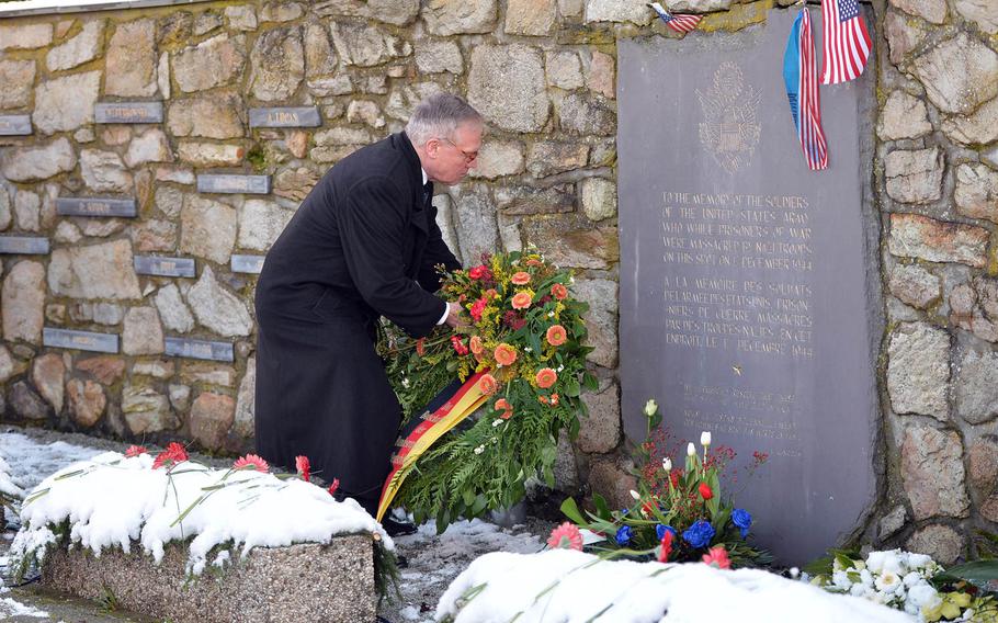 The German ambassador to Belgium, Eckart Cuntz, lays a wreath at the Malady Massacre Memorial at a ceremony marking the 70th anniversary of the Malady massacre, Sunday, Dec. 14, 2014. On Dec.17, 1944, Nazi SS troops murdered 84 American prisoners of war during the Battle of the Bulge. Baugnez is a suburb of Malmedy.