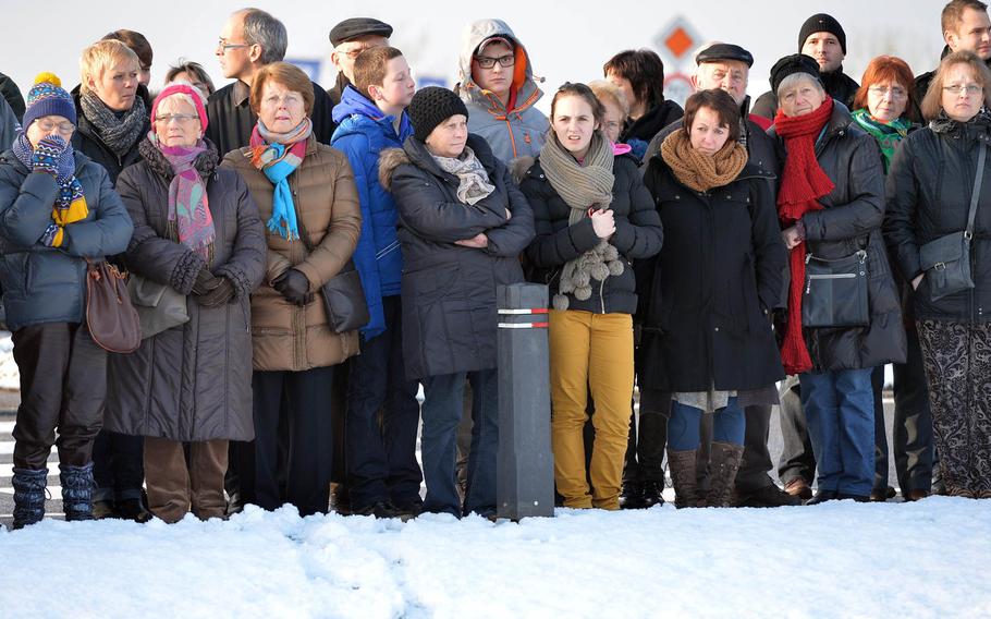 A crowd watches the  ceremony marking the 70th anniversary of the Malady massacre Sunday, Dec. 14, 2014. On Dec.17, 1944, in Baugnez, Belgium. Nazi SS troops killed 84 American prisoners of war during the Battle of the Bulge. Baugnez is a suburb of Malmedy.