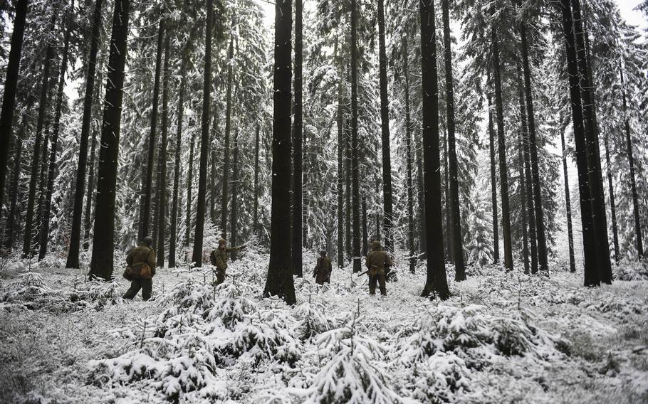 Dutch re-enactors portray the 106th Infantry Division on Dec. 14, 2014, in the heights above St. Vith, Belgium, where the 106th fought in the Battle of the Bulge 70 years ago.