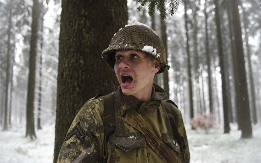 Leonard van Oord barks out commands while portraying a squad leader of the 106th Infantry Division during a Battle of the Bulge re-enactment on Dec. 13, 2014. The re-enactment took place in the same forest the 106th fought in 70 years ago.