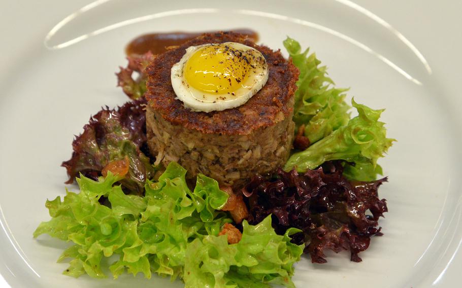 Ramstein's starter at the DODDS-Europe Culinary Faire was pork rillette with truffle oil, duck fat, lardons and quail egg.