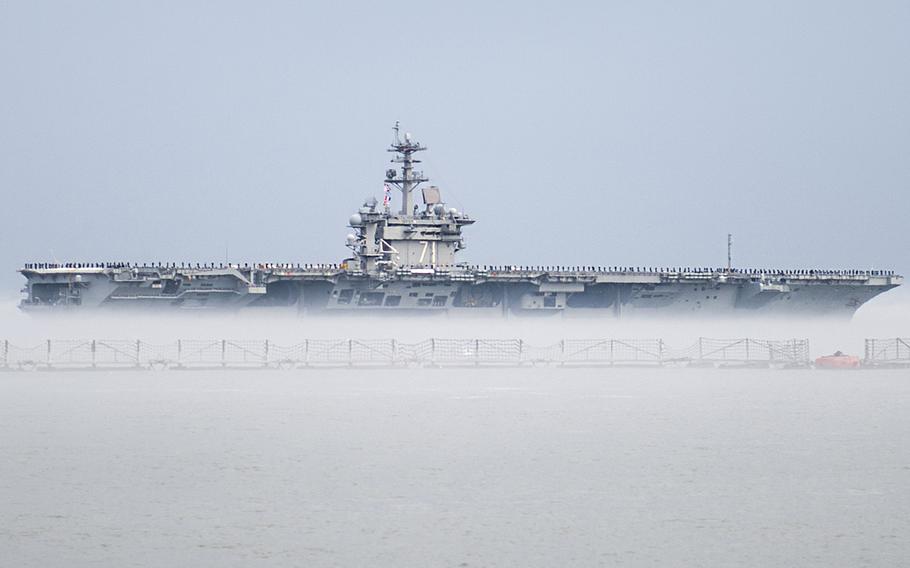 The aircraft carrier USS Theodore Roosevelt leaves Naval Station Norfolk for a scheduled deployment, March 11, 2015. The deployment is part of a regular rotation of forces to the 5th and 6th Fleet areas of operation.