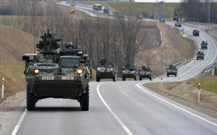 Strykers of Lightning Troop, 3rd Squadron, 2nd Cavalry Regiment convoy from Alytus, Lithuania, to the Polish border, Monday, March 23, 2015. They will continue their so-called Dragoon Ride through Poland and the Czech Republic to their home base at Vilseck, Germany, following training in Lithuania.