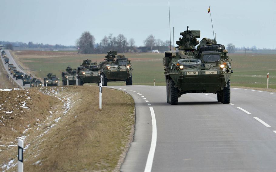 Strykers of Lightning Troop, 3rd Squadron, 2nd Cavalry Regiment convoy from Alytus, Lithuania, to the Polish border, Monday, March 23, 2015. They will continue their so-called Dragoon Ride through Poland and the Czech Republic to their home base at Vilseck, Germany, following training in Lithuania.