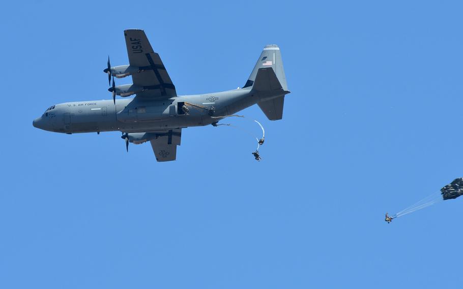Soldiers from the Vicenza, Italy-based 173rd Airborne Brigade jump out of a U.S. Air Force C-130 into the Smardan training center, Romania, on Tuesday, March 24, 2015.