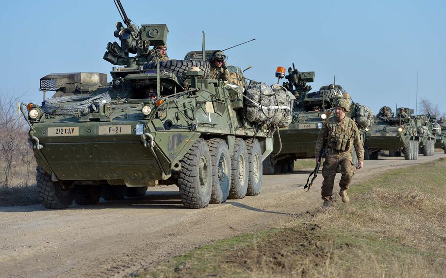 Strykers from 2nd Squadron, 2nd Cavalry Regiment roll into the Smardan training area in Romania to meet up with soldiers from the 173rd Airborne Brigade who parachuted in earlier as part of Operation Atlantic Resolve, onTuesday, March 24, 2015.