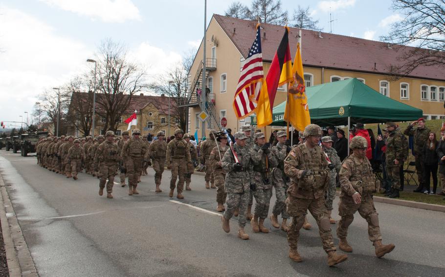 The leaders of the 3rd Squadron, 2nd Cavalry Regiment pass by the review booth as they parade through Rose Barracks in Vilseck, Germany, on April 1, 2015, at the conclusion of a 13-day long convoy that marked the end of their participation in the Operation Atlantic Resolve.