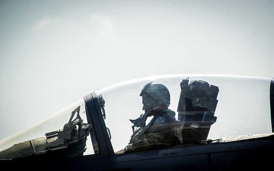 An F-15C Eagle pilot guides his jet into position at Leeuwarden Air Base, Netherlands, on March 31, 2015. F-15C Eagles from the Florida Air National Guard's 159th Expeditionary Fighter Squadron are deployed to Europe as the first ever ANG theater security package in Europe. 

Ryan Crane/U.S. Air Force