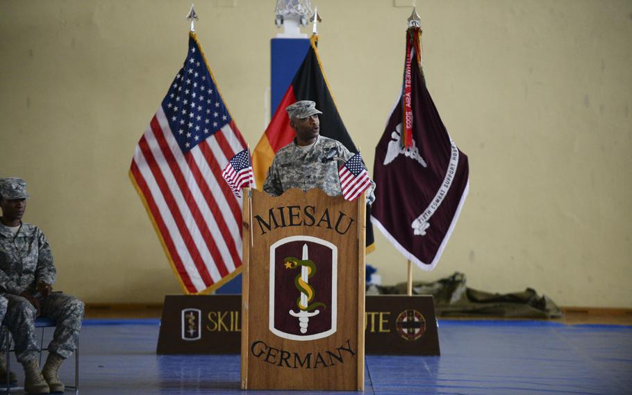 Col. Myron McDaniels, 212th Combat Support Hospital Commander, welcomes home 17 soldiers with the 67th Forward Surgical Team in the gymnasium on Miesau Army Depot, Germany, Tuesday, April 14, 2015. The soldiers had just returned from a nine-month deployment to Iraq.