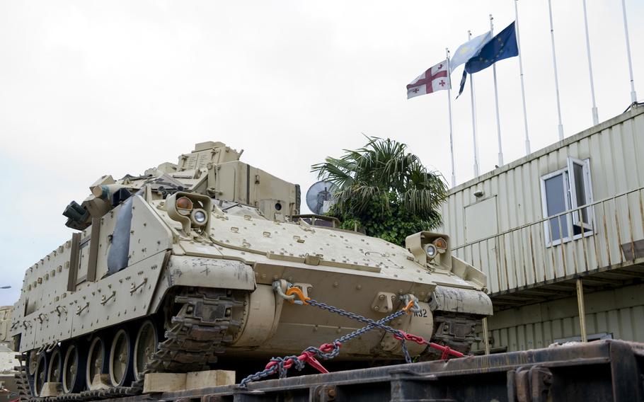 An American Bradley Infantry Fight Vehicle sits on a rail car Tuesday, May 5, 2015, at a port in Batumi, Georgia, before the start of Noble Partner 15, a joint exercie involving roughly 600 American and Georgian troops. The military drills will help prepare the Georgian troops for their upcoming rotation as part of the NATO Response Force, which is tasked with responding to crisis situations.