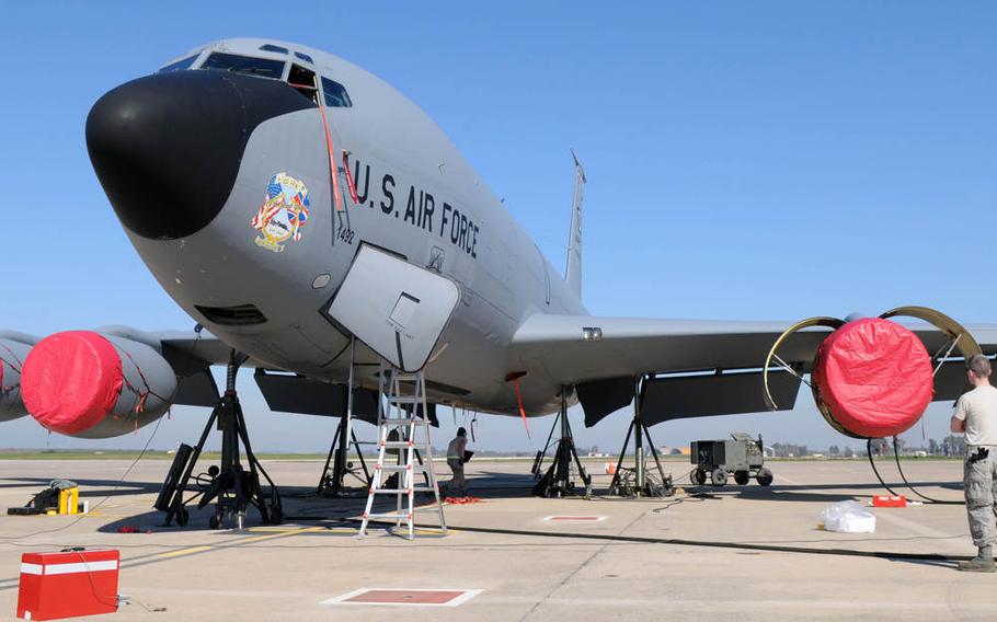 A KC-135 Stratotanker sits with its landing gear fully raised on hydraulic jacks Feb. 5, 2013, at an air base in southwest Europe. Jacks allow maintainers to conduct tests involving raising and lowering the aircraft's landing gear. Airmen from RAF Mildenhall, England, deployed to southwest Europe in January to support French operations in Mali.