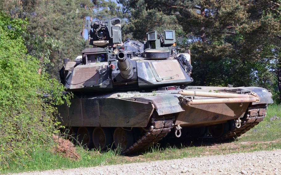A U.S. M1-A2 Abrams tank assigned to the 1st Armored Brigade Combat Team, 3rd Infantry Division, provides security during the Combined Resolve IV exercise at the U.S. Army?s Joint Multinational Readiness Center in Hohenfels, Germany, on May 27, 2015.