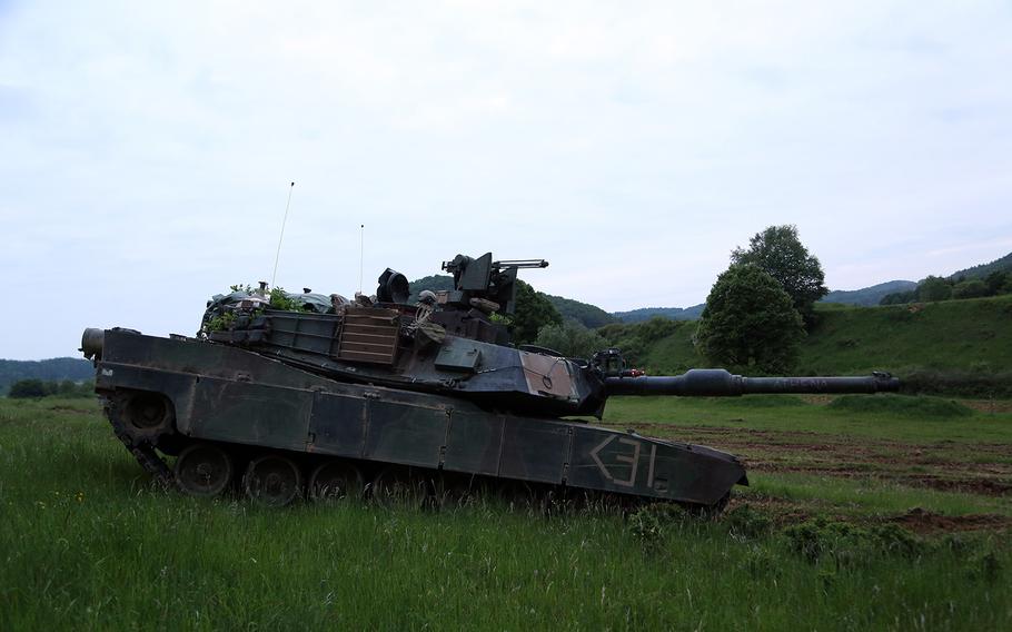 U.S. soldiers of the 3rd Combined Arms Battalion, 69th Armored Regiment scout for opposing forces while conducting troop movement training during exercise Combined Resolve IV at the U.S. Army?s Joint Multinational Readiness Center in Hohenfels, Germany, May 27, 2015.