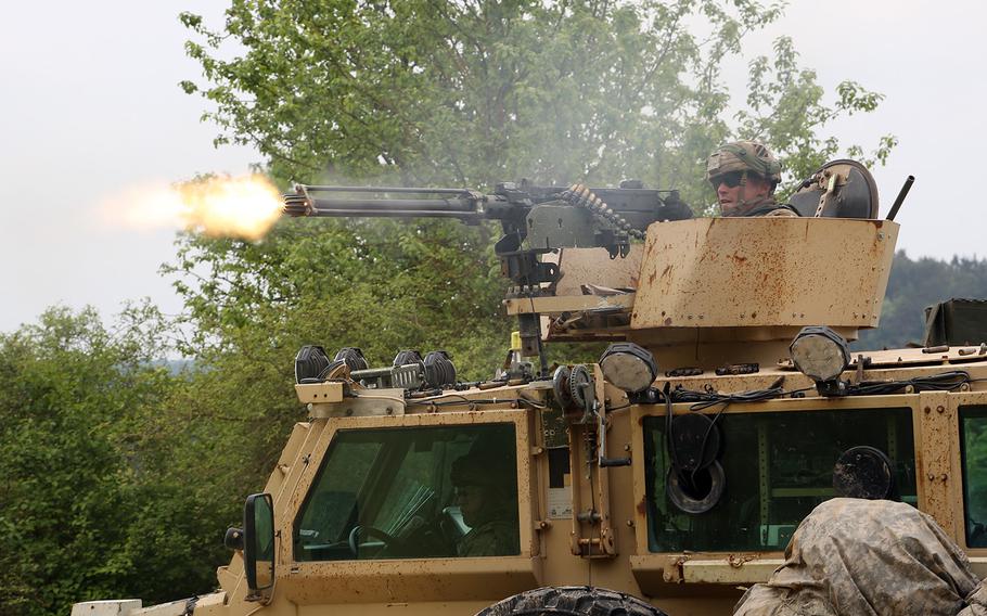 A 10th Brigade Engineer Battalion soldier fires a M2A1 machine gun while conducting route-clearing operations during exercise Combined Resolve IV at the U.S. Army?s Joint Multinational Readiness Center in Hohenfels, Germany, May 24, 2015.