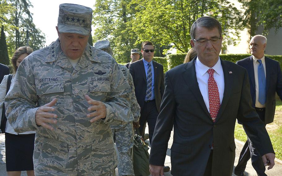 Secretary of Defense Ash Carter walks with Gen. Philip Breedlove, commander of U.S. European Command, as they prepare to meet in Stuttgart, Germany, June 5, 2015.
