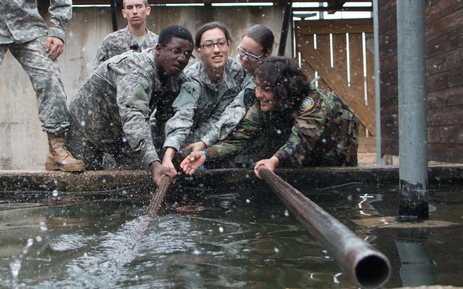 While at the U.S. Army Garrison Grafenwoehr, Germany leadership-reaction course, Junior ROTC cadets from Department of Defense Education Activity-Europe schools tested took on a series of challenges on June 18, 2015, as part of their weeklong summer camp.