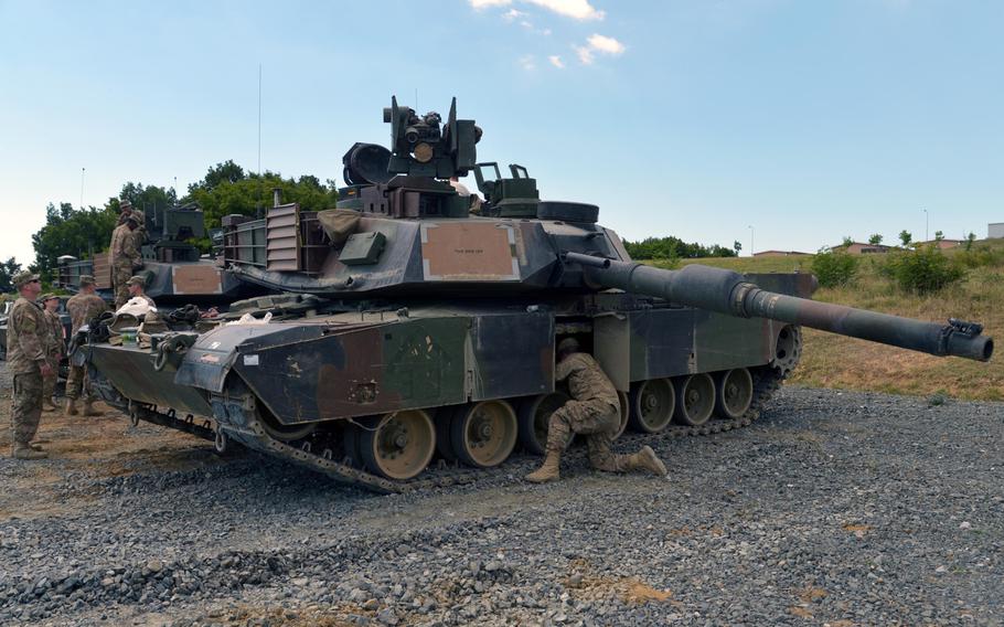 Tank crews from the 3rd Infantry Division?s 3rd Combined Arms Battalion, 69th Armored Regiment, out of Fort Stewart, Ga., prepare their two M1A2 Abrams tanks for Thursday's live-fire exercise at the Novo Selo Training Area in Bulgaria, Wednesday, June 24, 2015.

Michael Abrams/Stars and Stripes