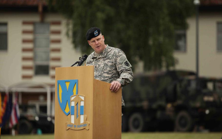 Maj. Gen. Duane A. Gamble gives his first remarks after taking command of the 21st Theater Sustainment Command in a ceremony Wednesday, June 24, 2015, in Kaiserslautern, Germany.