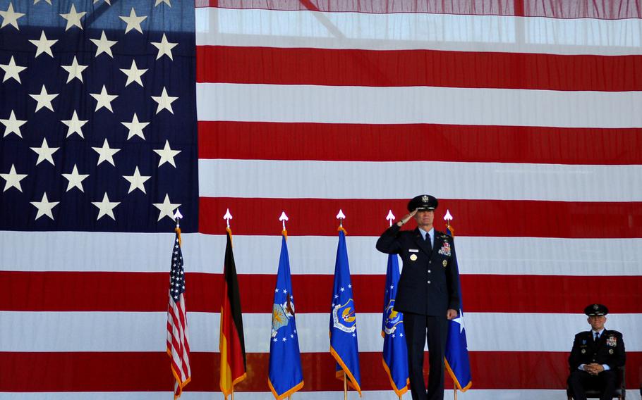 Lt. Gen. Darryl L. Roberson returns a final salute before officially handing over command of 3rd Air Force to his successor, Lt. Gen. Timothy M. Ray, during a change of command ceremony Thursday, July 2, 2015, at Ramstein Air Base in Germany.