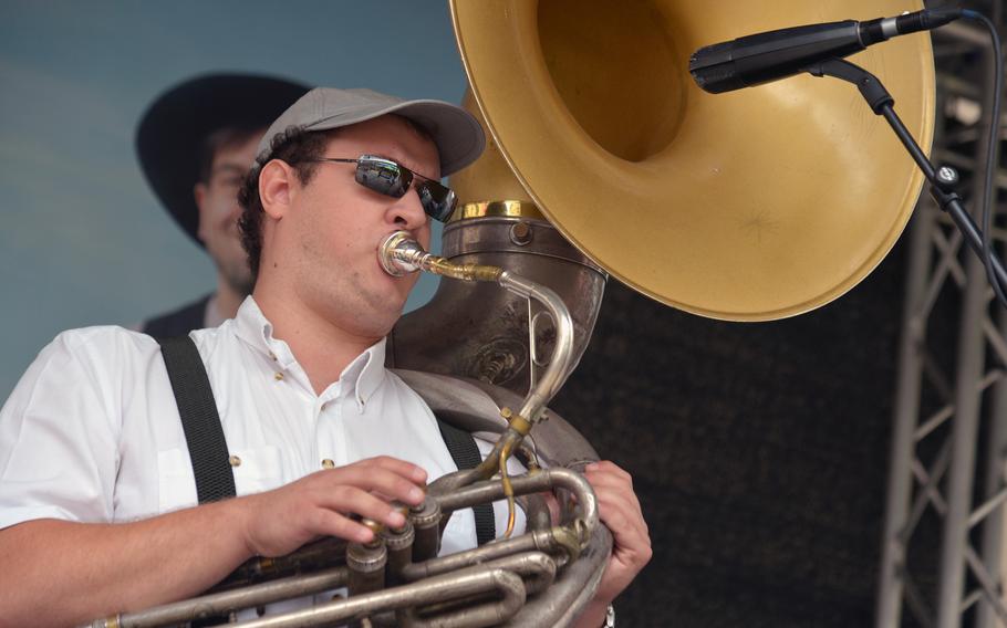 The tuba player for Brass to Go, a band made up of music students from Mannheim, Germany, keeps the beat during their set at the Swinging Lautern jazz festival in downtown Kaiserslautern, Germany, Friday Sept. 4, 2015.