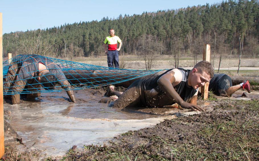 Participants in the 4th Annual Grafenwoehr rugged terrain obstacle run held Saturday, April 9, 2016 in Grafenwoehr, Germany, had to conquer nearly 30 obstacles before reaching the finish line.